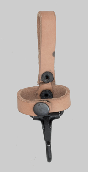 Iimage of Yugoslavian AKM belt hanger with snap closure.